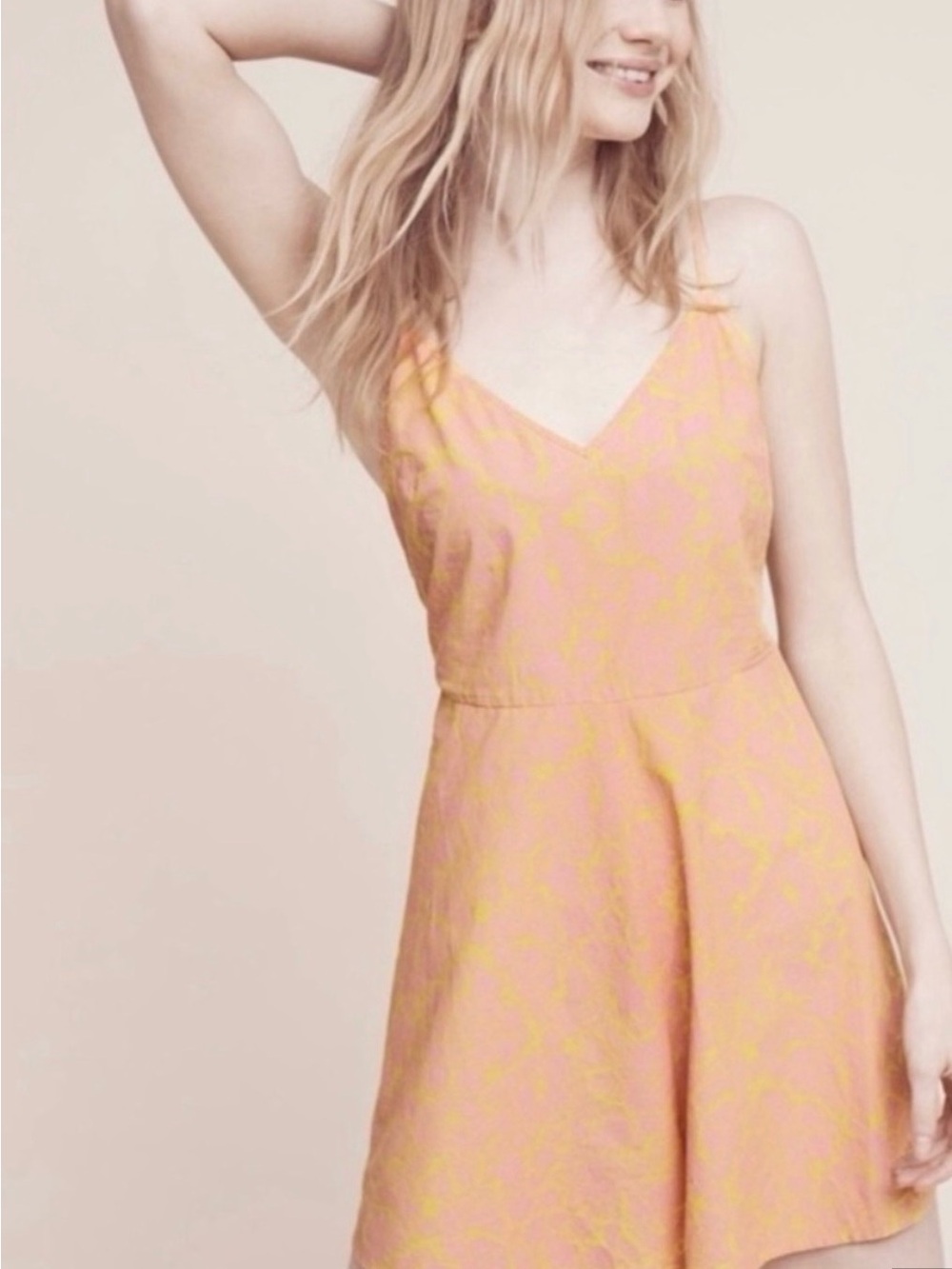 Anthropologie lilka romper Peach and Yellow V-Neck Romper
